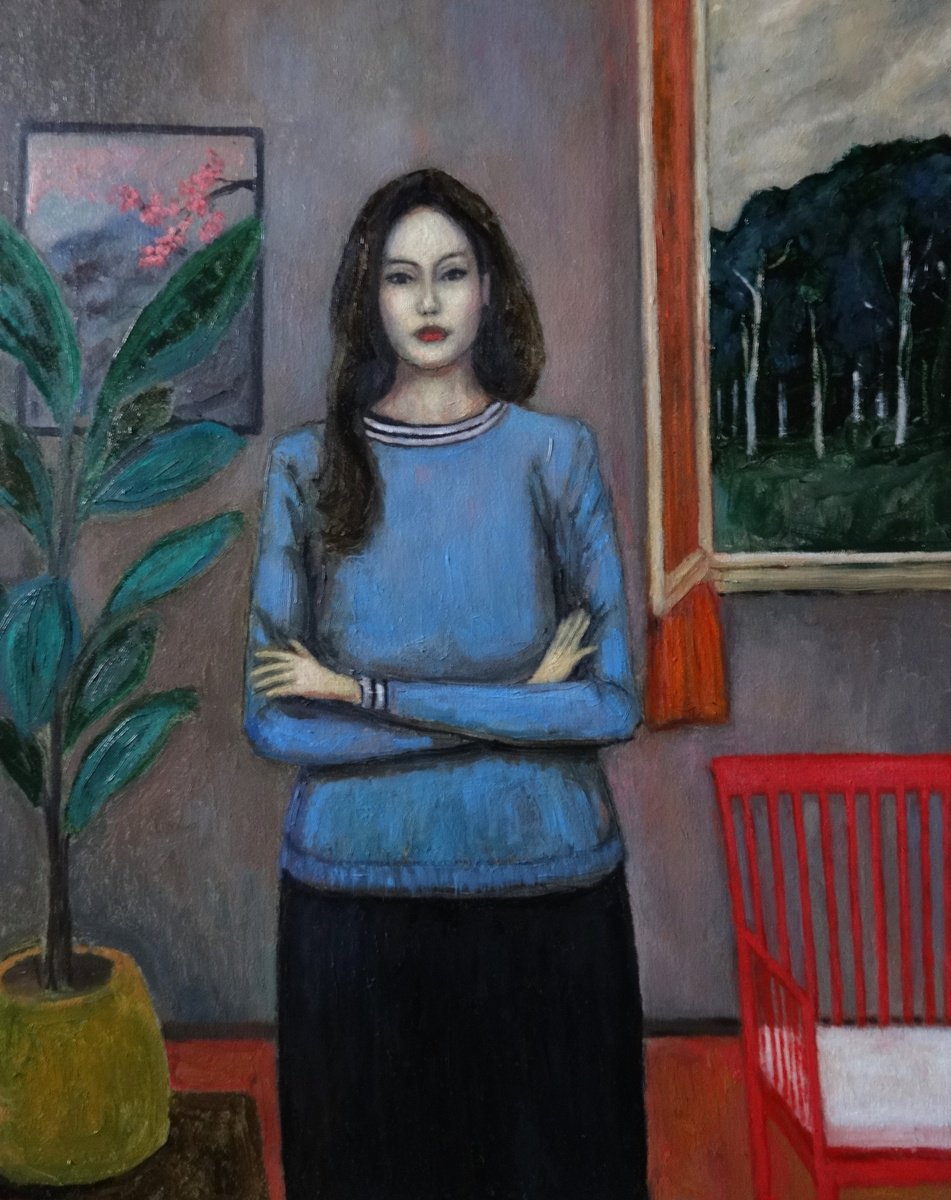 Woman with plant and red chair by Massimiliano Ligabue