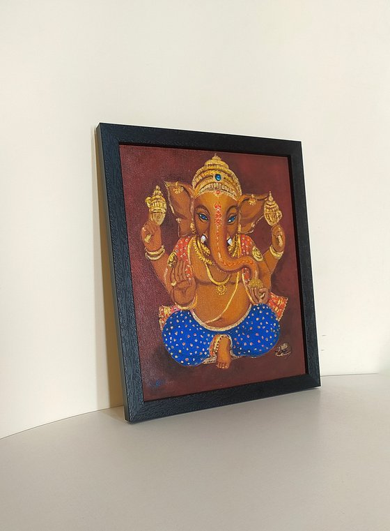 Lord Ganesh with blue eyes