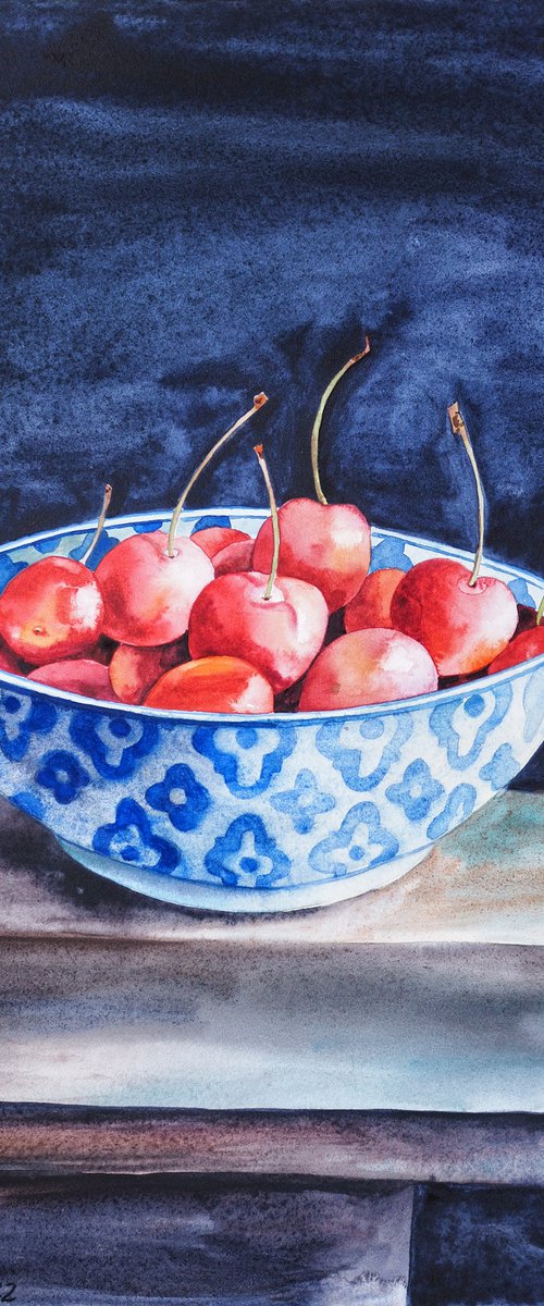 Cherries in patterned bowl by Delnara El