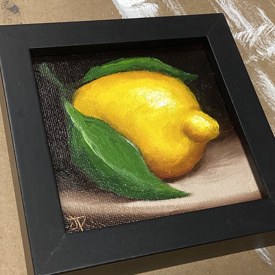 Little leafy lemon still life