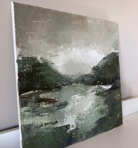 Dark textured green lagoon river mountains