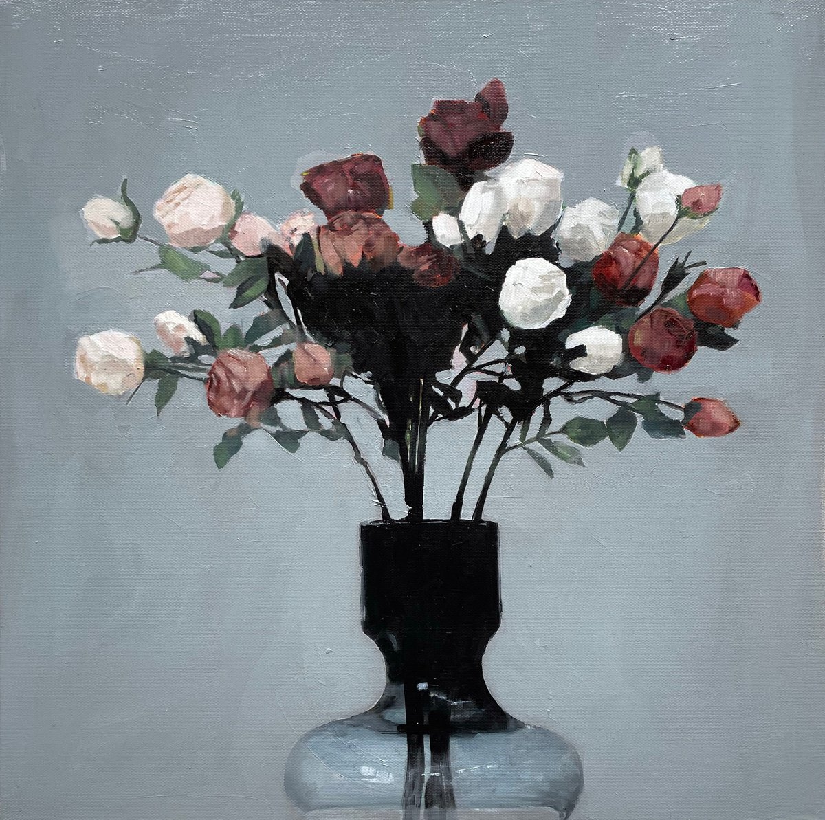 flowers in glass vase by Elina Evstig
