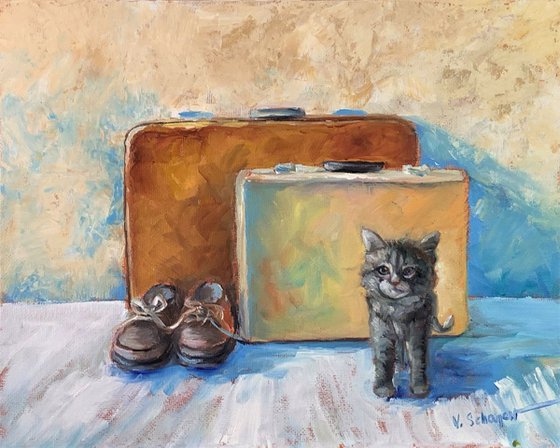 Suitcases and a cat.