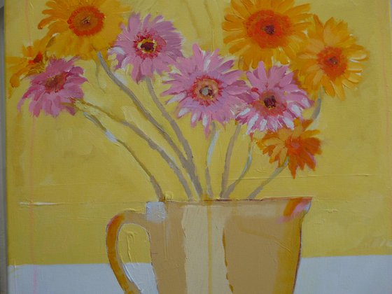 Gerbera flowers in old stone jug