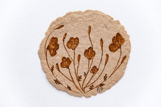Small abstract flowers in brown