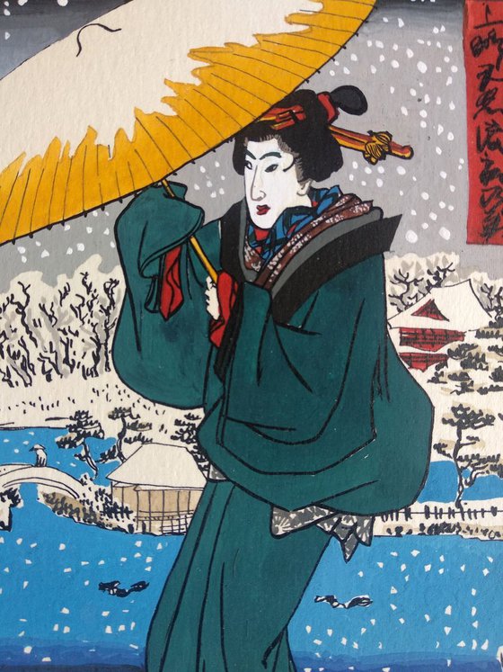 Young woman with umbrella and snow landscape