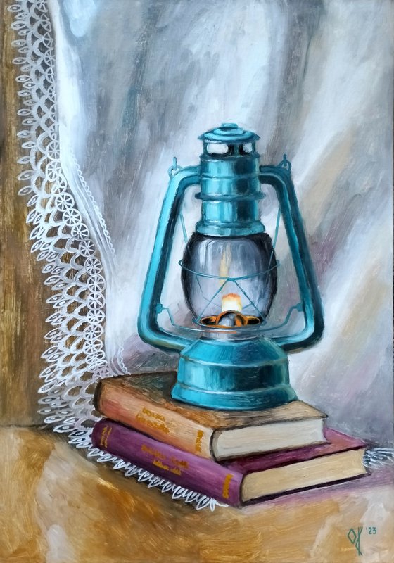 Paraffin Lamp and Books