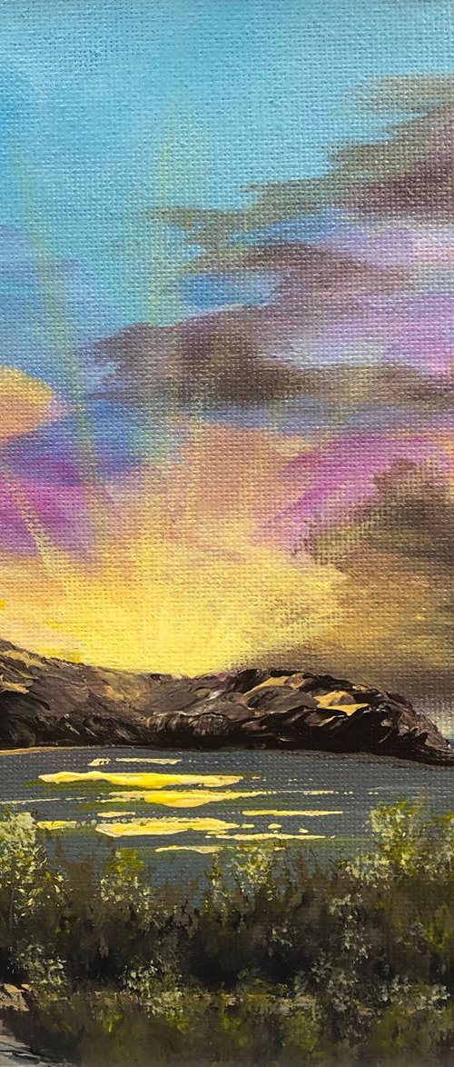 Sunrise over Lulworth Cove in a frame by Marja Brown