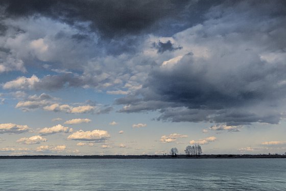 Floating clouds like ships in the sky.