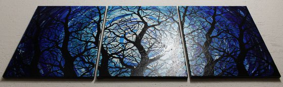 Triptych silhouettes of night trees