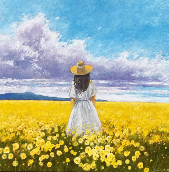 Summer. Woman in flower field