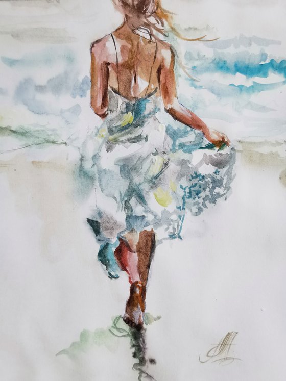 Girl running to the sea