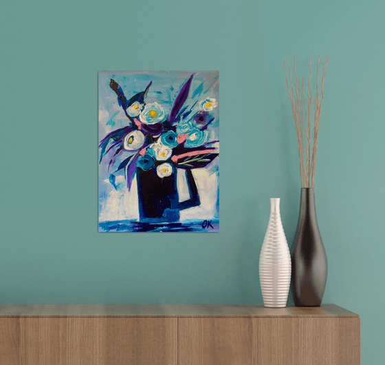 Wildflower still life in a blue vase.