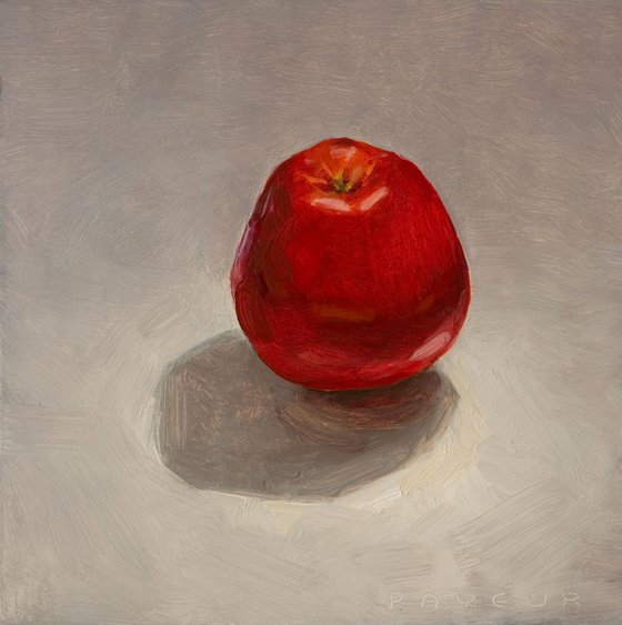 still life of red apple on a white background