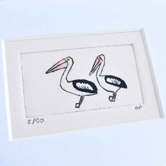 Small framed two pelicans