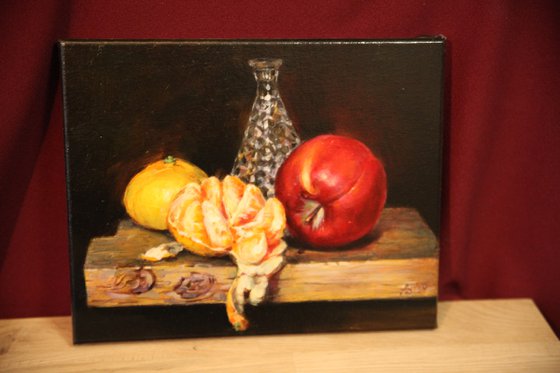 "Still life with a red apple."
