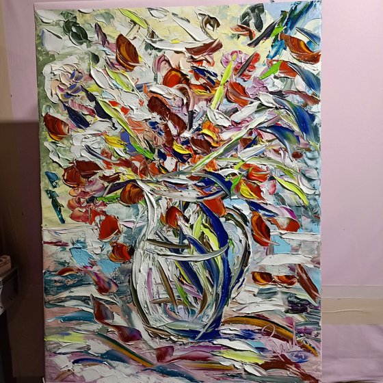 Vaso con fiori arancio