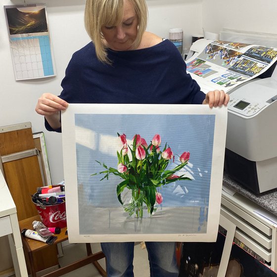 Tulips in glass vase