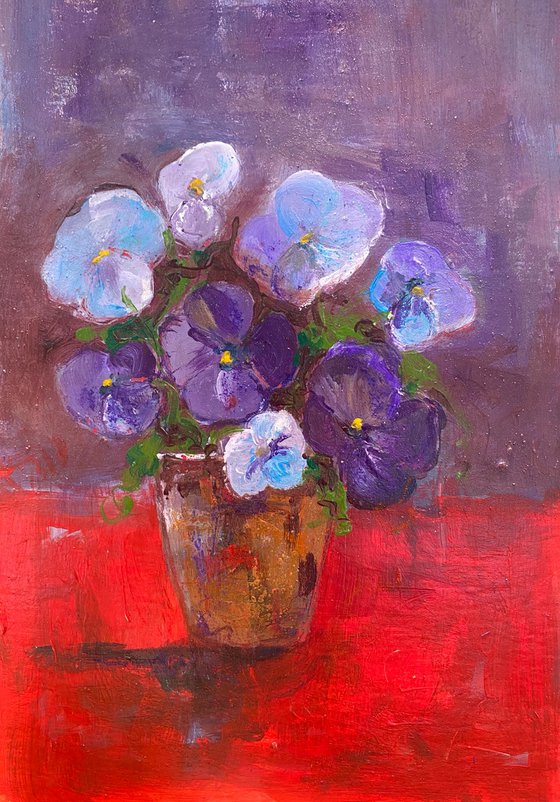 Purple pansies in a pot