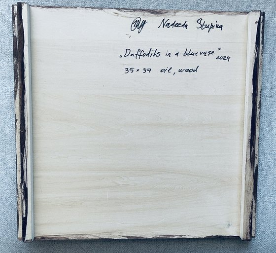 Daffodils in a blue vase