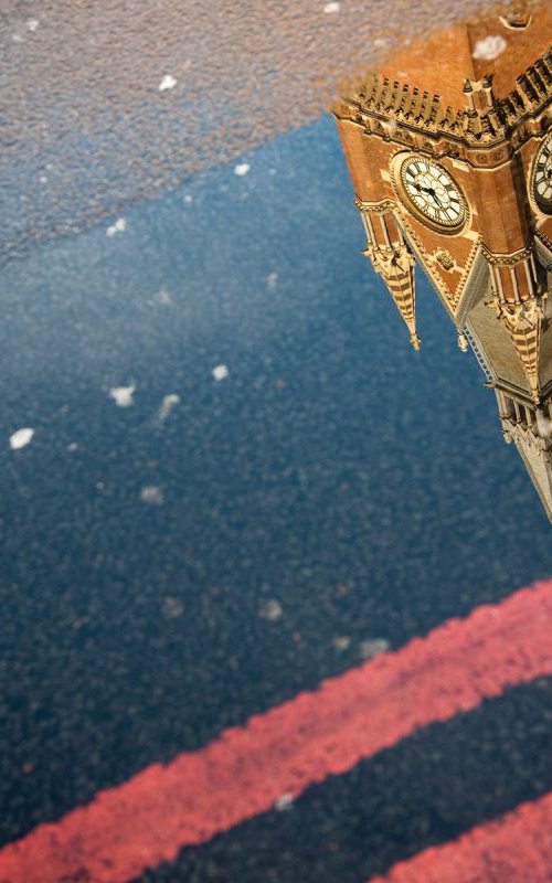 St Pancras Clock Tower Puddle Reflection, London by Paula Smith