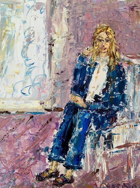Portrait of a seated young woman