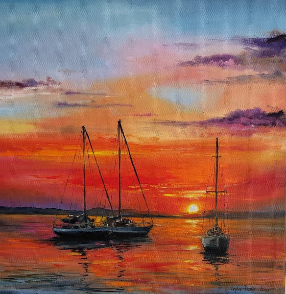 Sailing boats at sunset