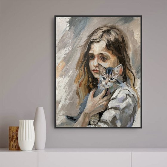 Girl with Maine Coon kitten