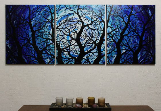 Triptych silhouettes of night trees