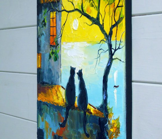 Cats Watching the Sunset Together