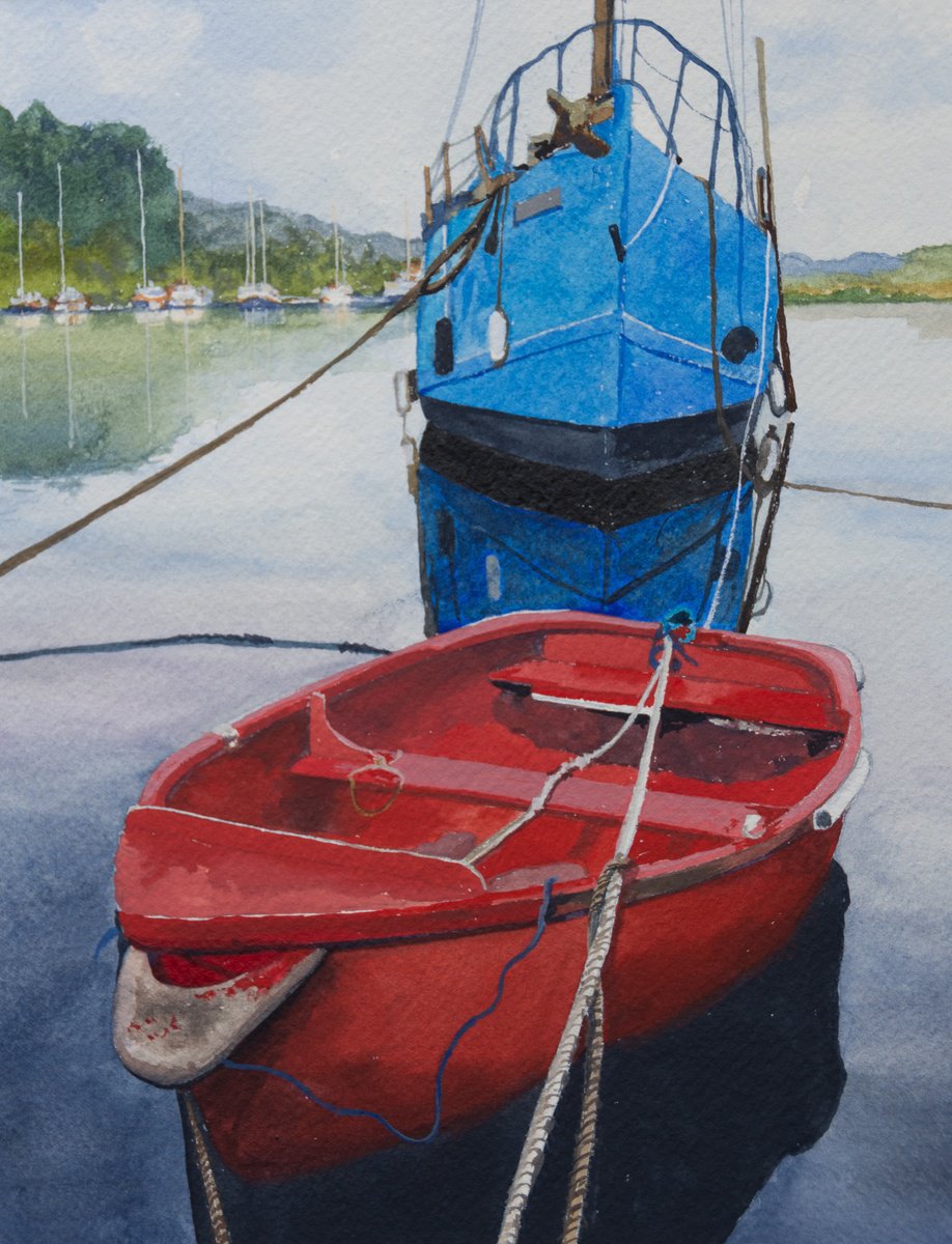 Red rowboat and blue trawler by Sue Cook