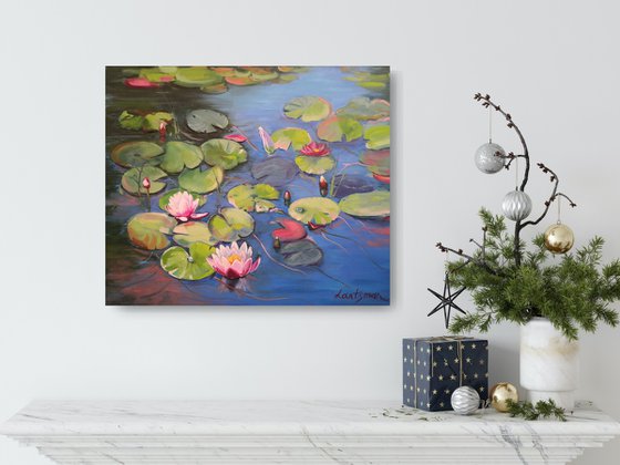 Waterlily pond with lotus flowers landscape