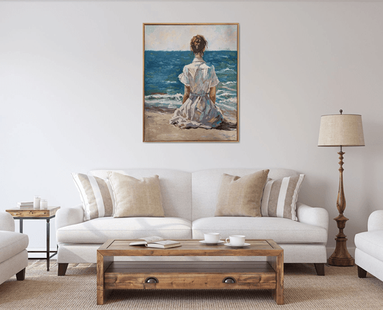 Woman by the ocean.