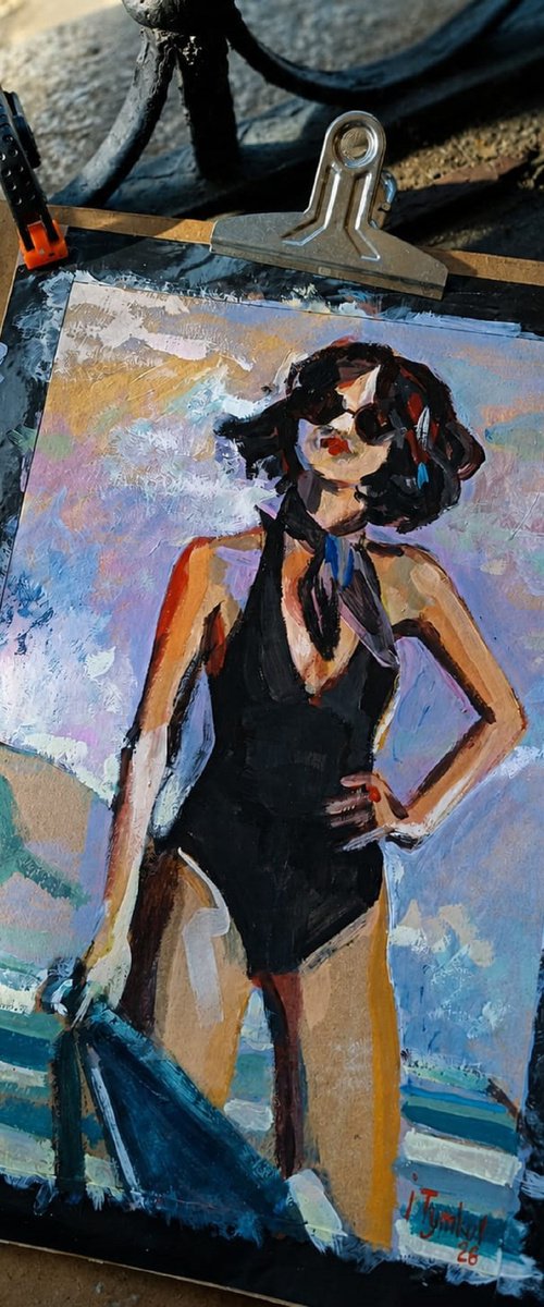 Girl in a black swimsuit On the beach by Iryna Tymkul
