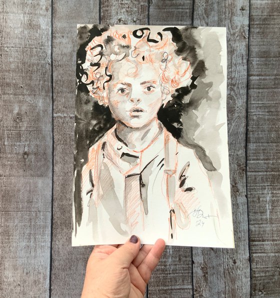 Portrait of a curly-haired boy