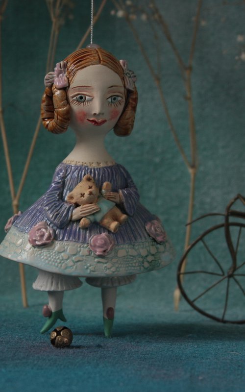 Little Girl in an blue dress with a teddy. Hanging sculpture, bell doll by Elya Yalonetski by Elya Yalonetski