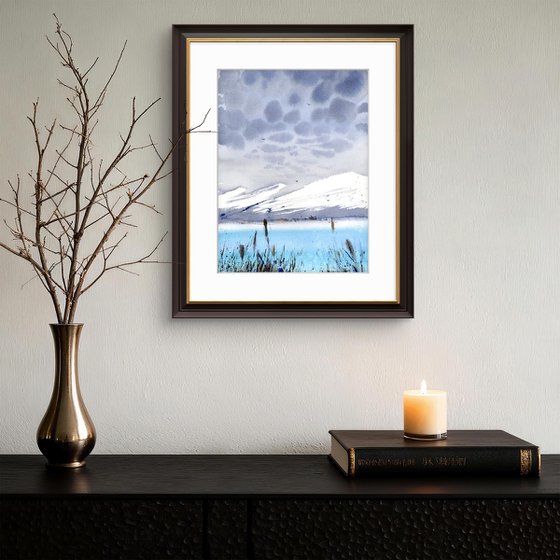 BLUE LAKE IN THE MOUNTAINS