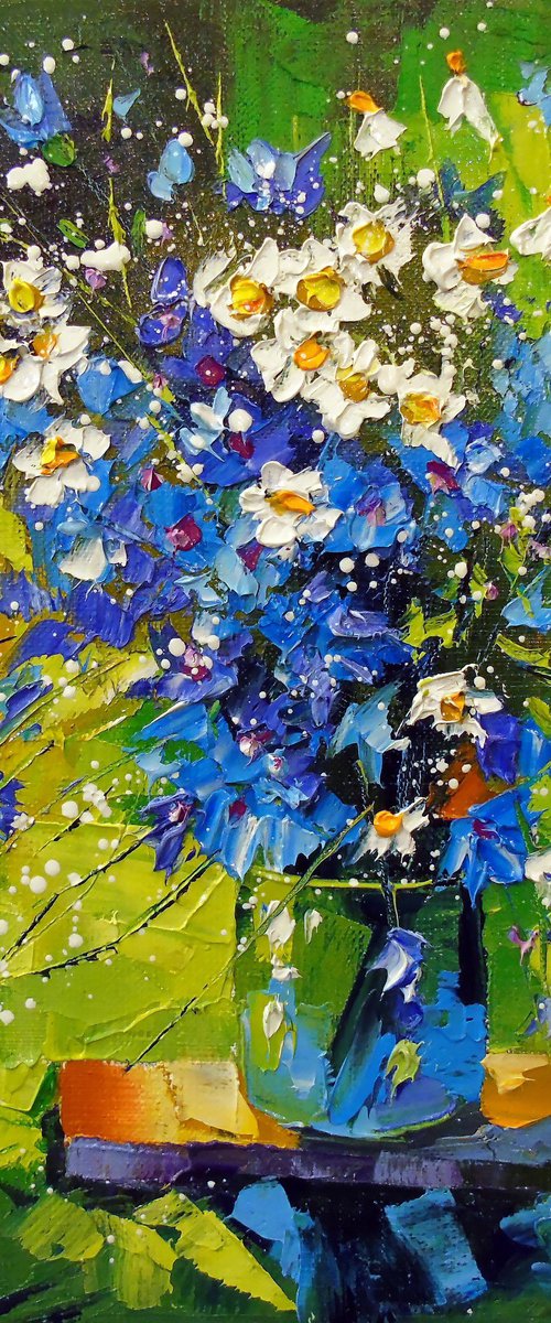 A bouquet of meadow blue flowers by Olha Darchuk
