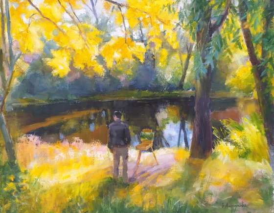 An artist near the lake