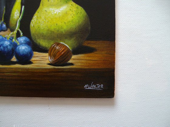 Pear and grape in silver goblet