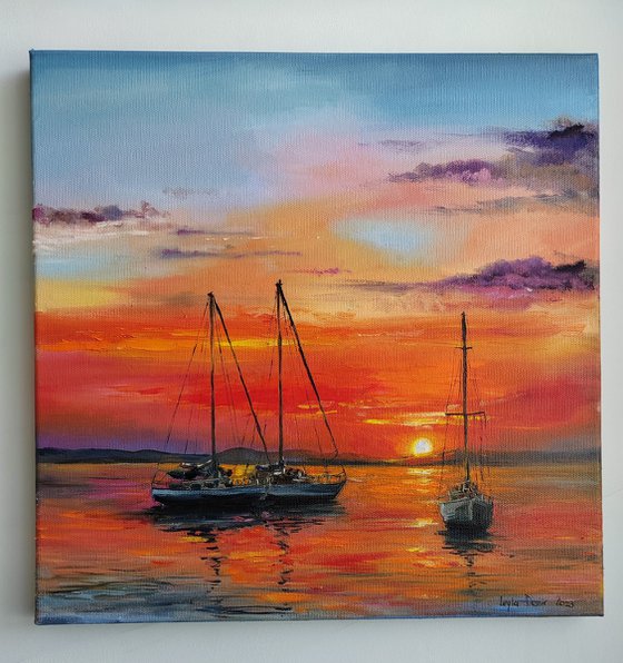 Sailing boats at sunset