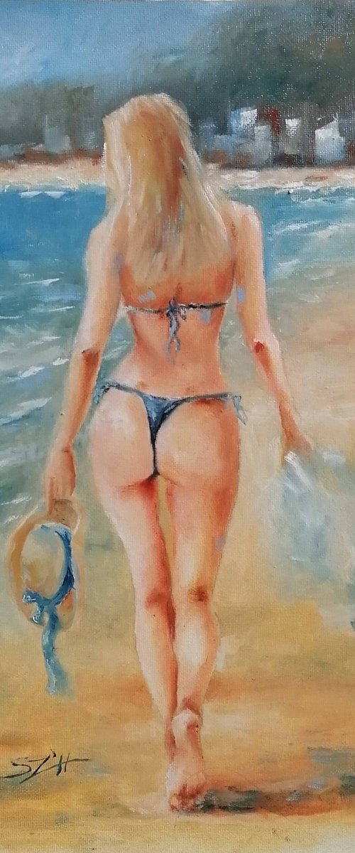 Woman on the beach by Susana Z. Harris