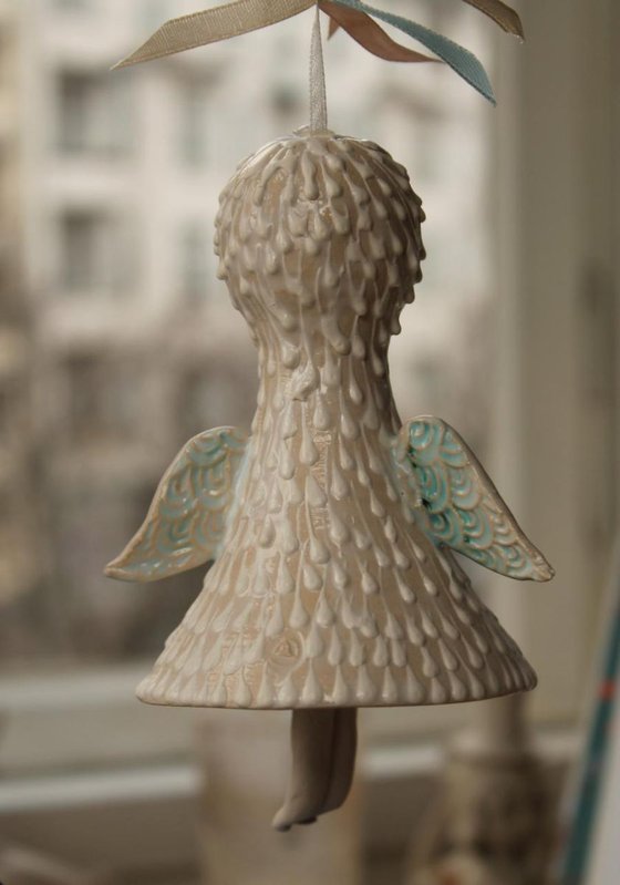Angel. Bell-Doll, little ceramic sculpture.
