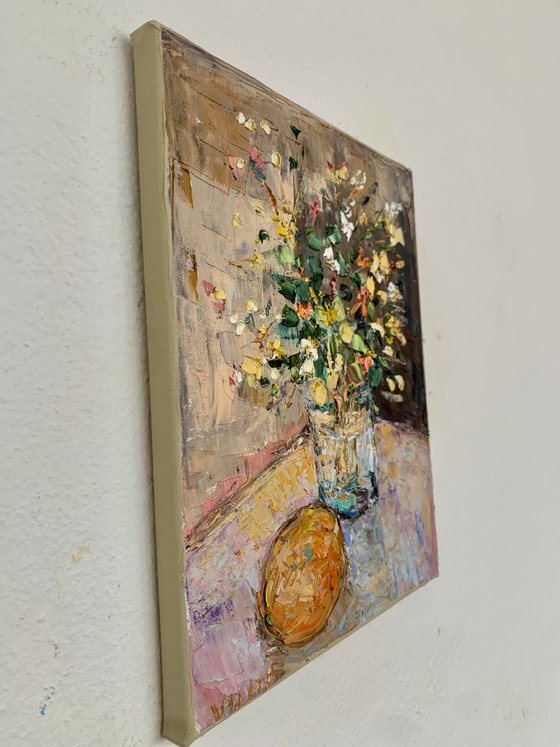 Still life with flowers and orange