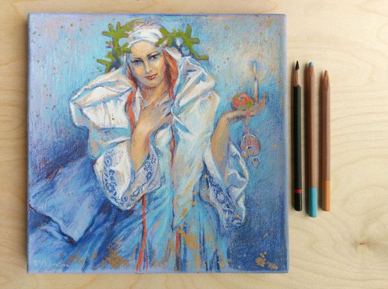 Christmas celebrating. Woman with a candle.Tribute to  Alphonse Mucha