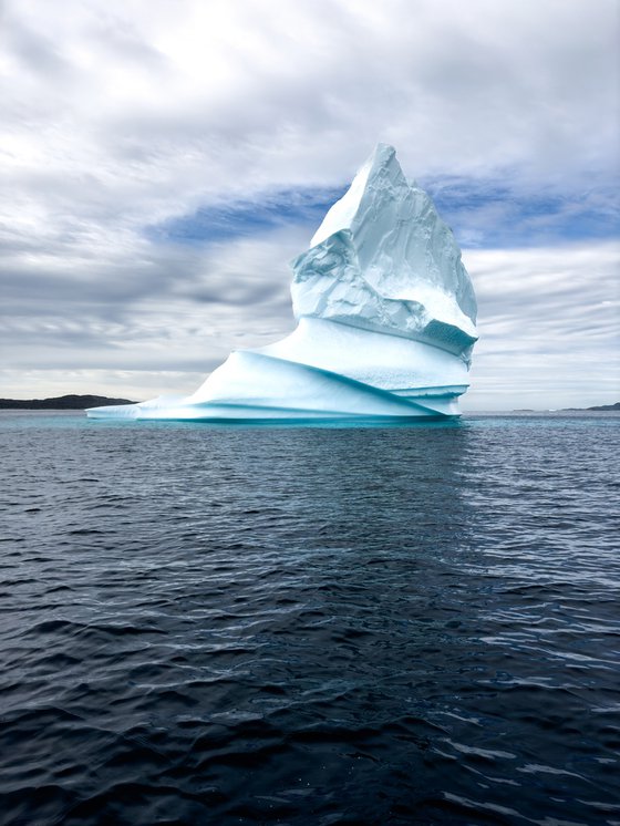 BLUE SEA AND BIG ICEBERG