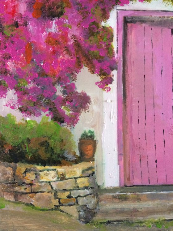 Mediterranean House with Pink Flowers