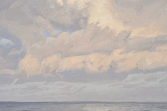 Clouds over the sea, morning sun