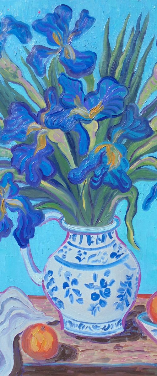 Vase of Irises with oranges. by Kirsty Wain