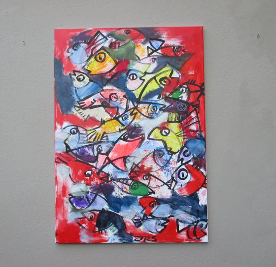 coloured fishes jumping